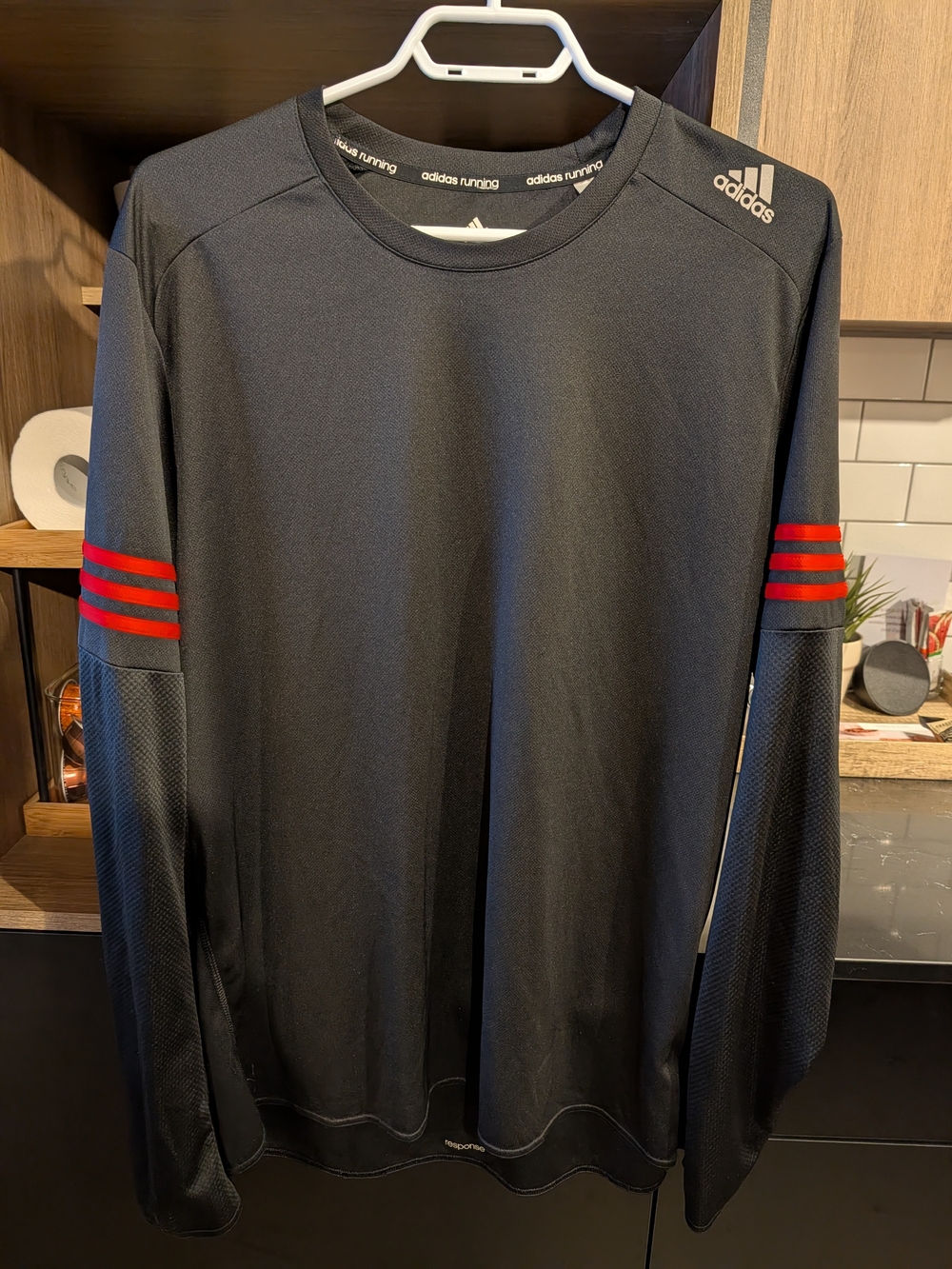 adidas Women’s Black Long-Sleeve Performance Tee with Red Sleeve Stripes